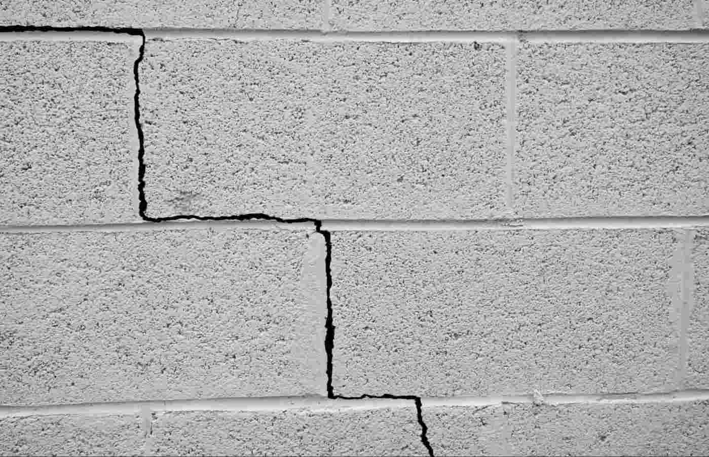 Stair-step cracks, one of the most serious types of foundation cracks in masonry block walls